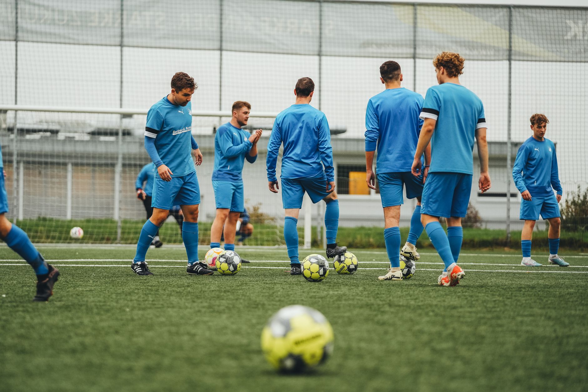 soccer team training on outdoor field